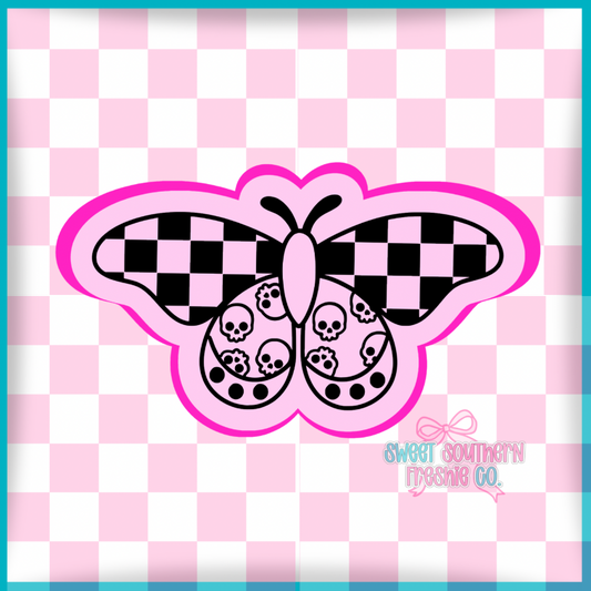 Checkered moth with skulls