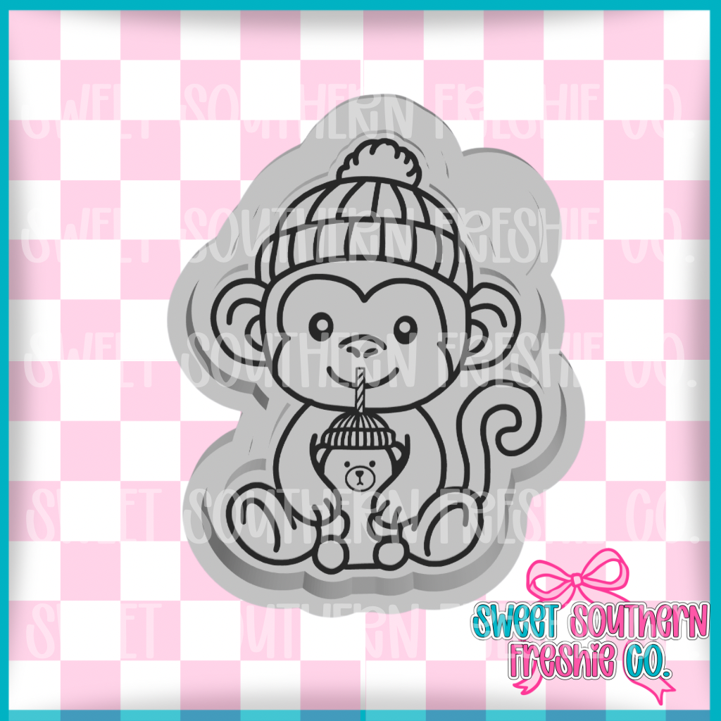 Monkey with cup
