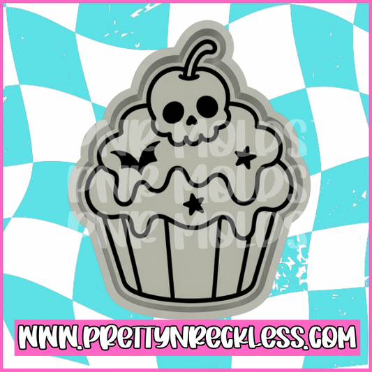 Skull cherry bat cupcake